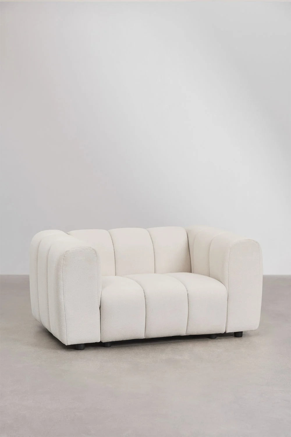 Sillón en tela bouclé Eliot – Confort y Estilo en Armonía - Ami home decor