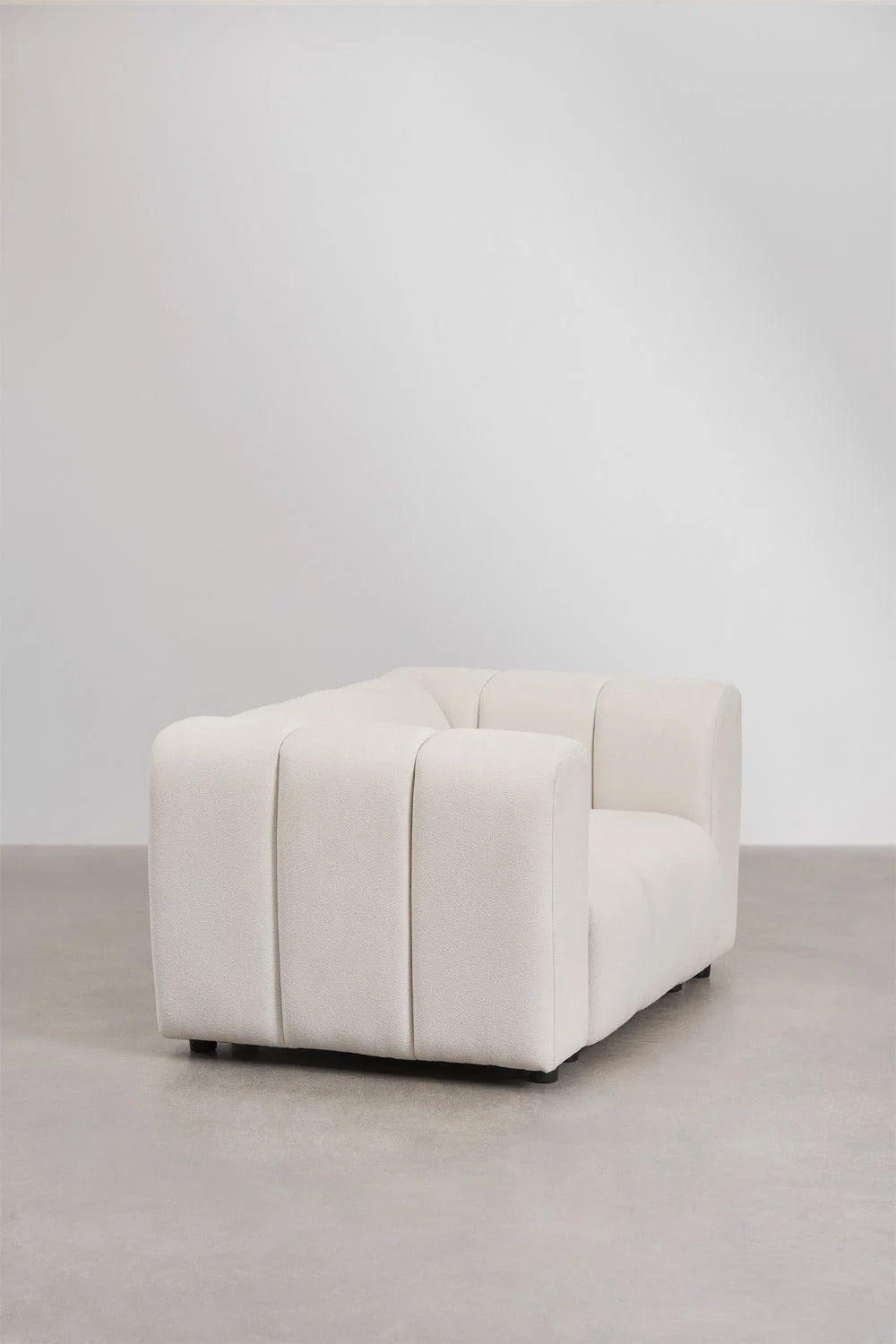 Sillón en tela bouclé Eliot – Confort y Estilo en Armonía - Ami home decor