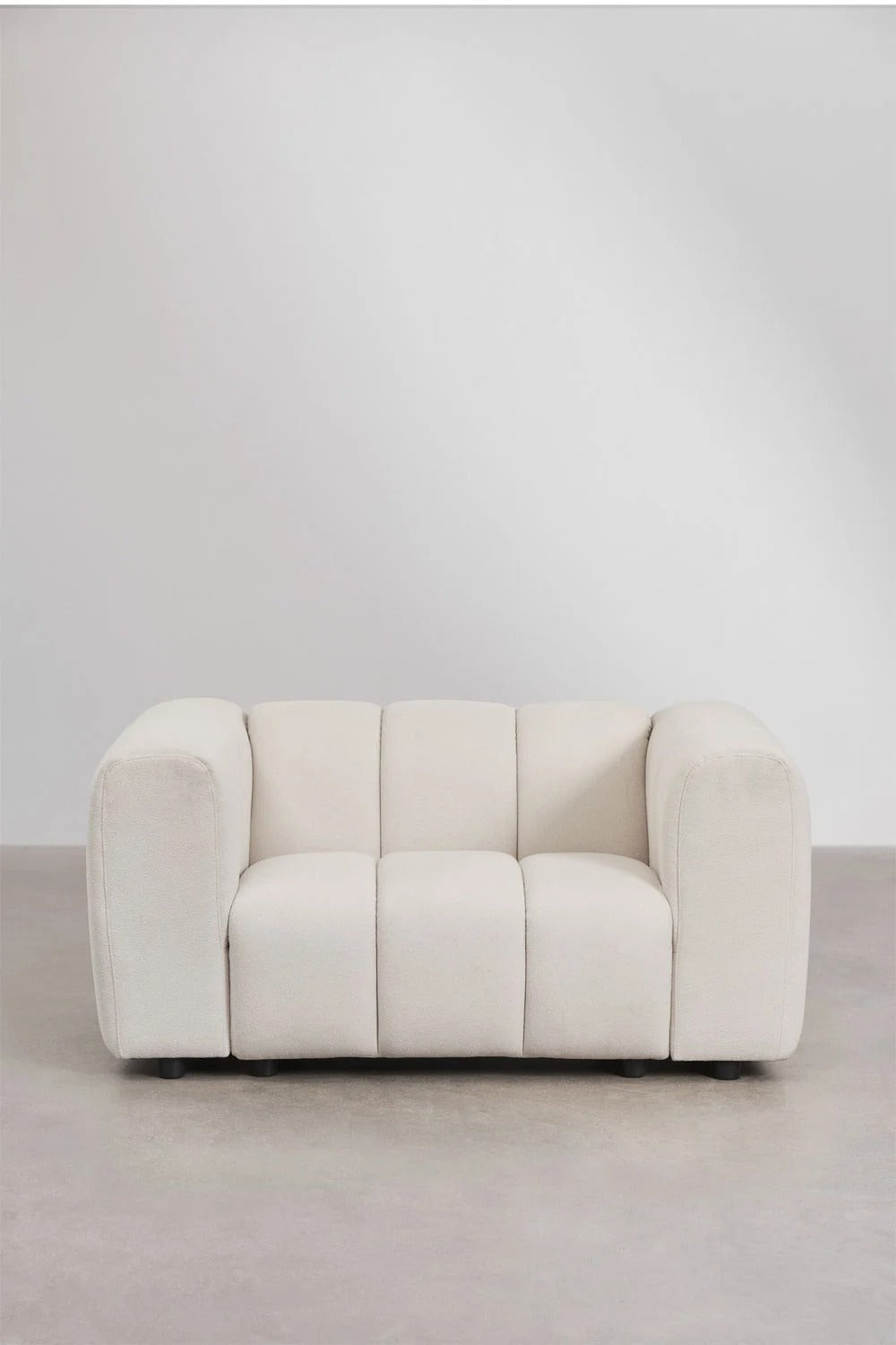 Sillón en tela bouclé Eliot – Confort y Estilo en Armonía - Ami home decor